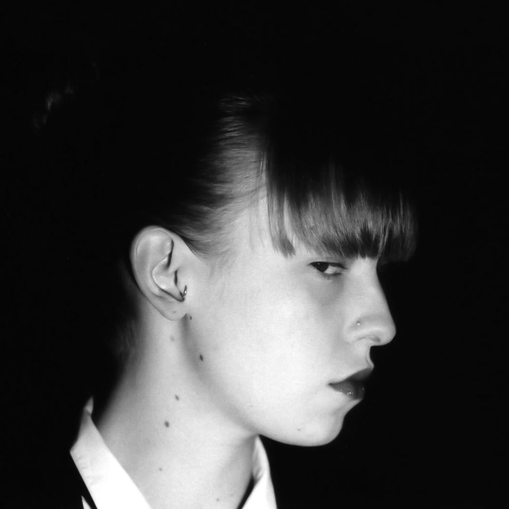 aima-lichtblau-photography-black-and-white-negative-ilford-fp4-crimes-and-devotion-noit-portrait-main-image